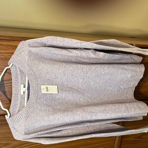 Light weight cotton sweater. Light purple with  some heathering of blue